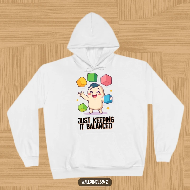 Funny hoodie featuring a delightful, wobbly pixel character in the act of juggling multiple colorful cubes, offering warmth and humor.