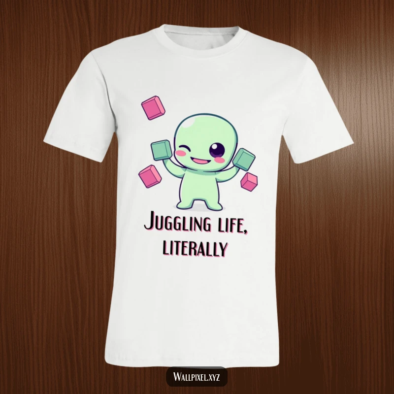Funny pixel art t-shirt featuring a grinning pixelated alien character winking and juggling three floating squares, perfect for sci-fi and gaming enthusiasts.